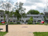 Schoffel of hark in adres, wonen in beton