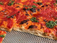 Pizza en wijn in Romeinse sfeer aan de Newtonstraat