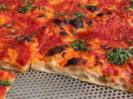 Pizza en wijn in Romeinse sfeer aan de Newtonstraat